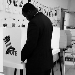 LAUSD School Board Candidate Alex Johnson casts vote at election primary