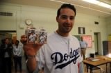 Andre Ethier holding up milk carton at Nightingale middle school LAUSD