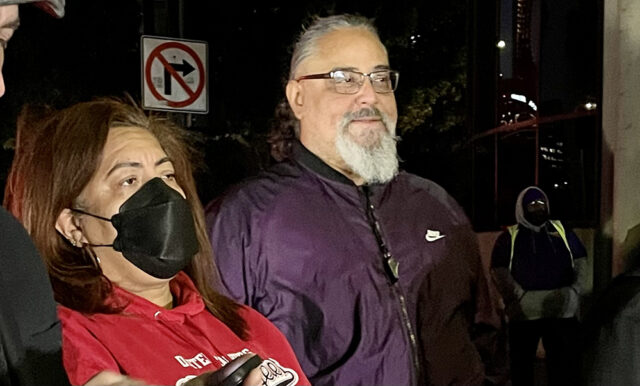 A photo of United Teachers Los Angeles President Cecily Myart-Cruz standing with SEIU Executive Director Max Arias