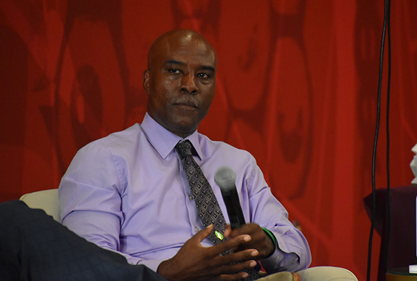 Photo of Irvin Davis listening during a panel discussion