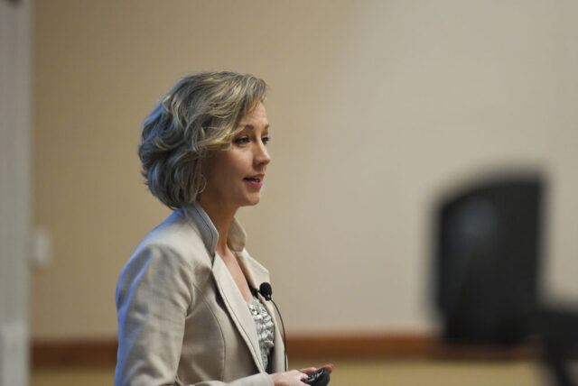 Michele Gay speaks at an event