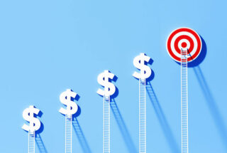 A conceptual image that shows dollar signs and a target